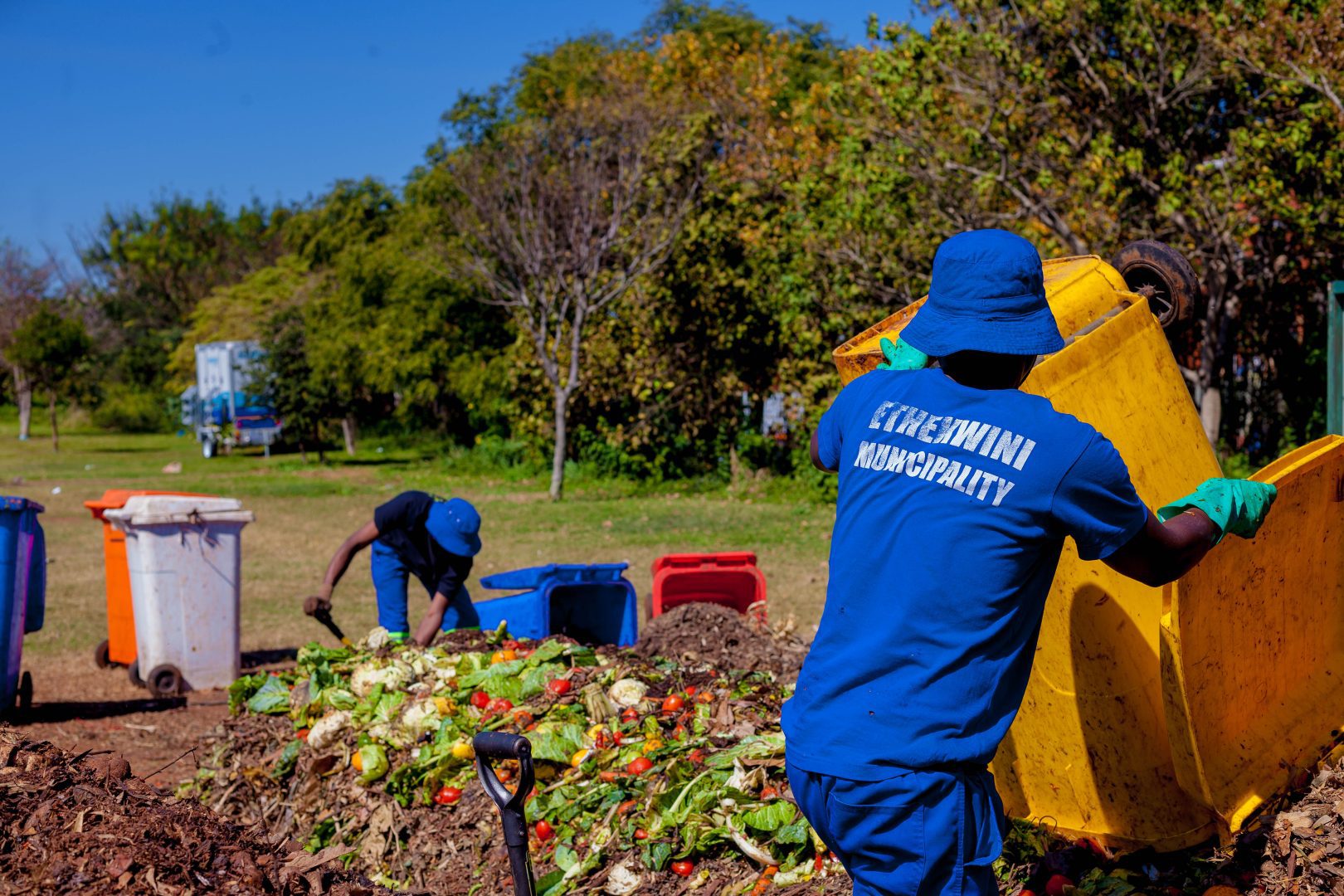 Workers at the Durban Botanic Garden prepare organic waste from the Early Morning Market to be composted